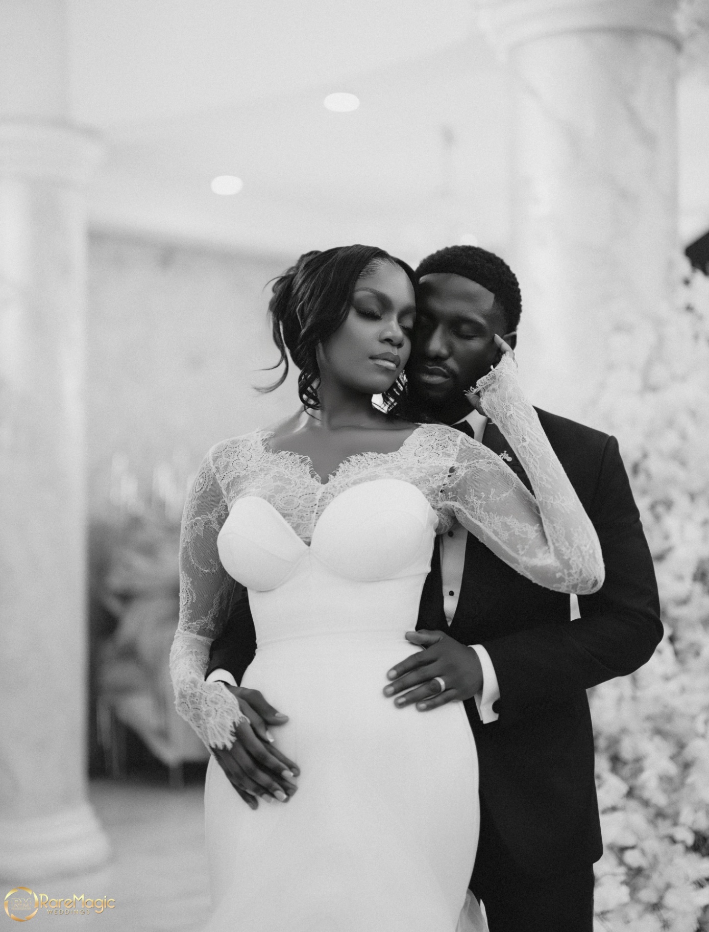 Black and white portrait of the couple in an embrace