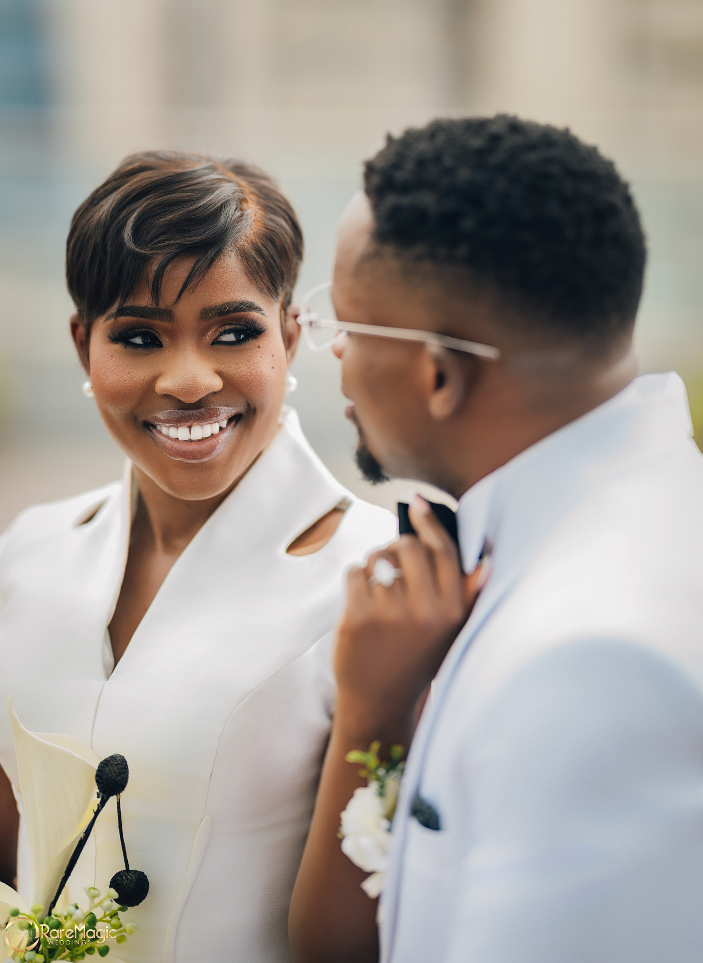 Close-up portrait of the bride smiling at the groom during their session